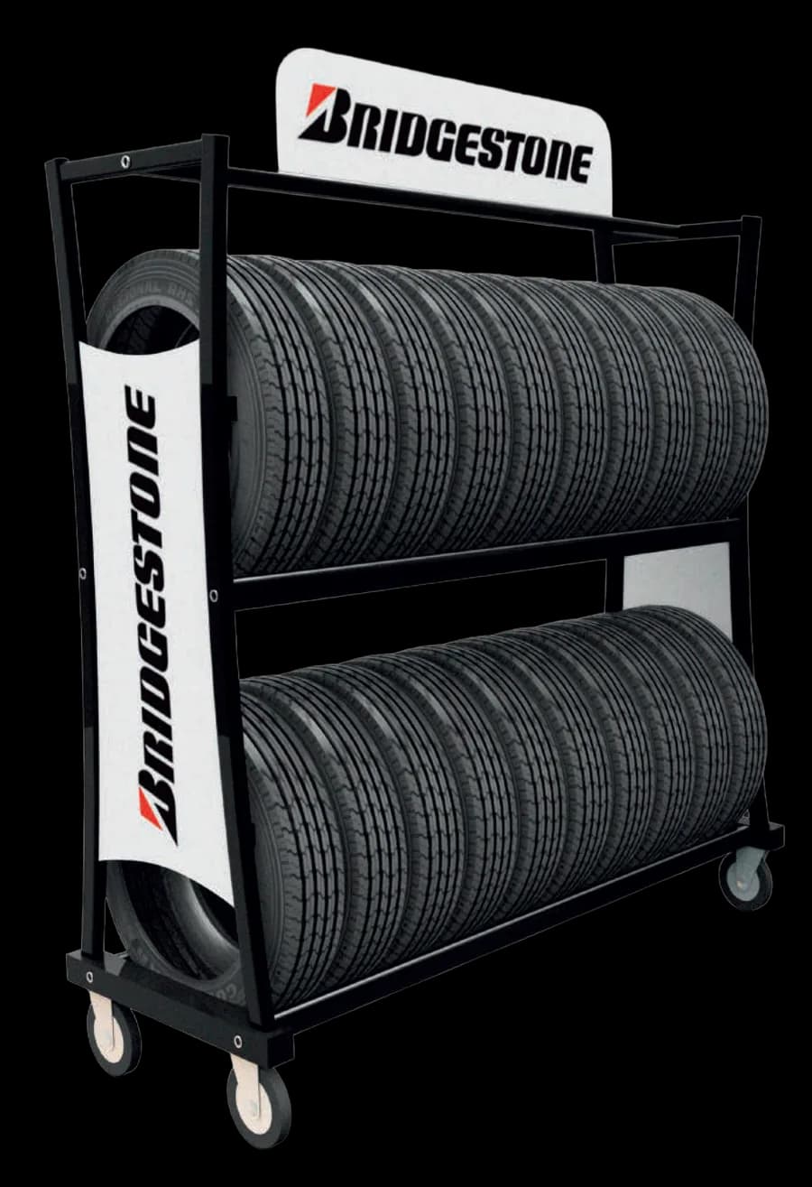 Two-tier trolley in black lacquered steel tube, on castors with a printed header