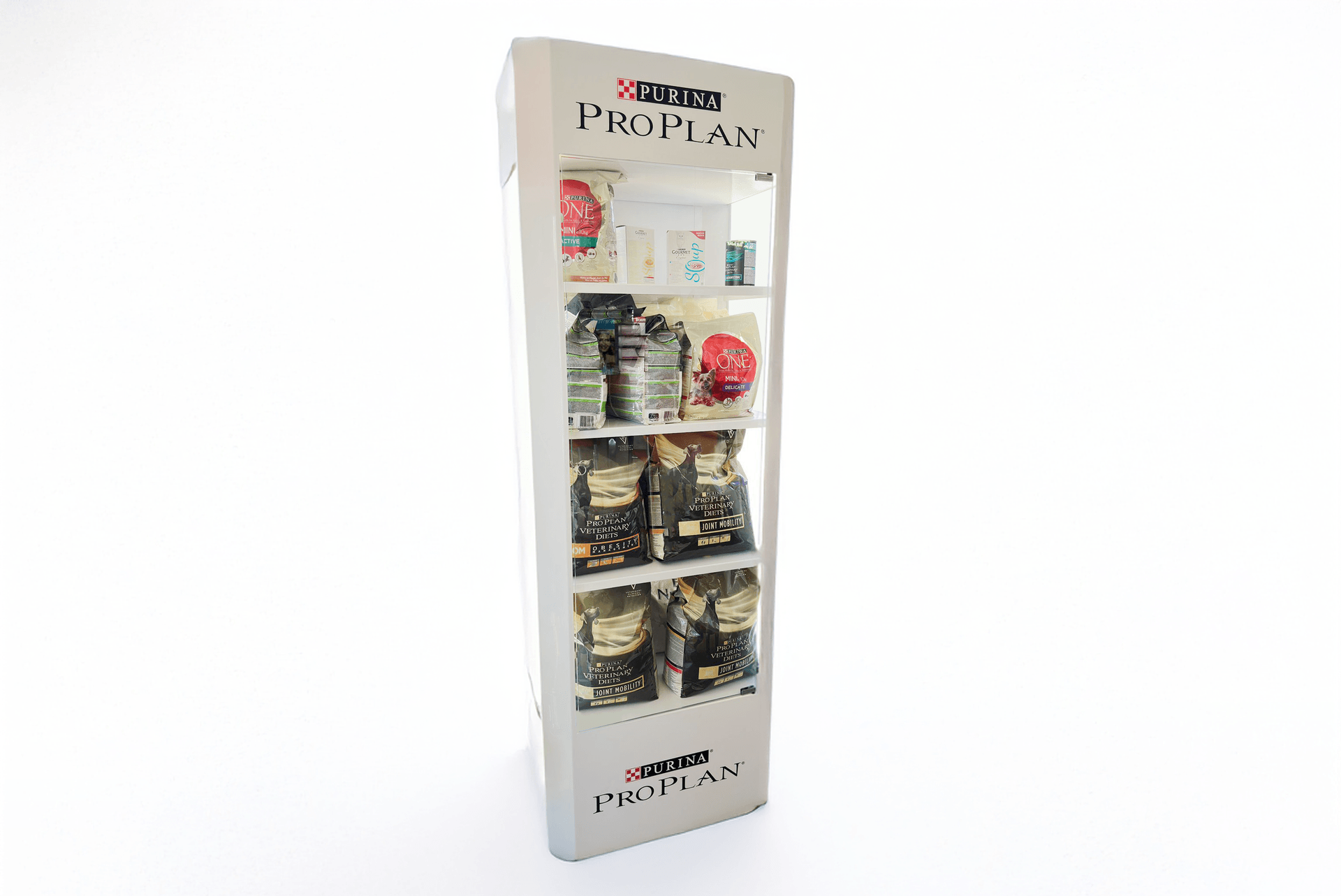 Tall white display showcase with four shelves filled with assorted Purina Pro Plan pet food bags.
