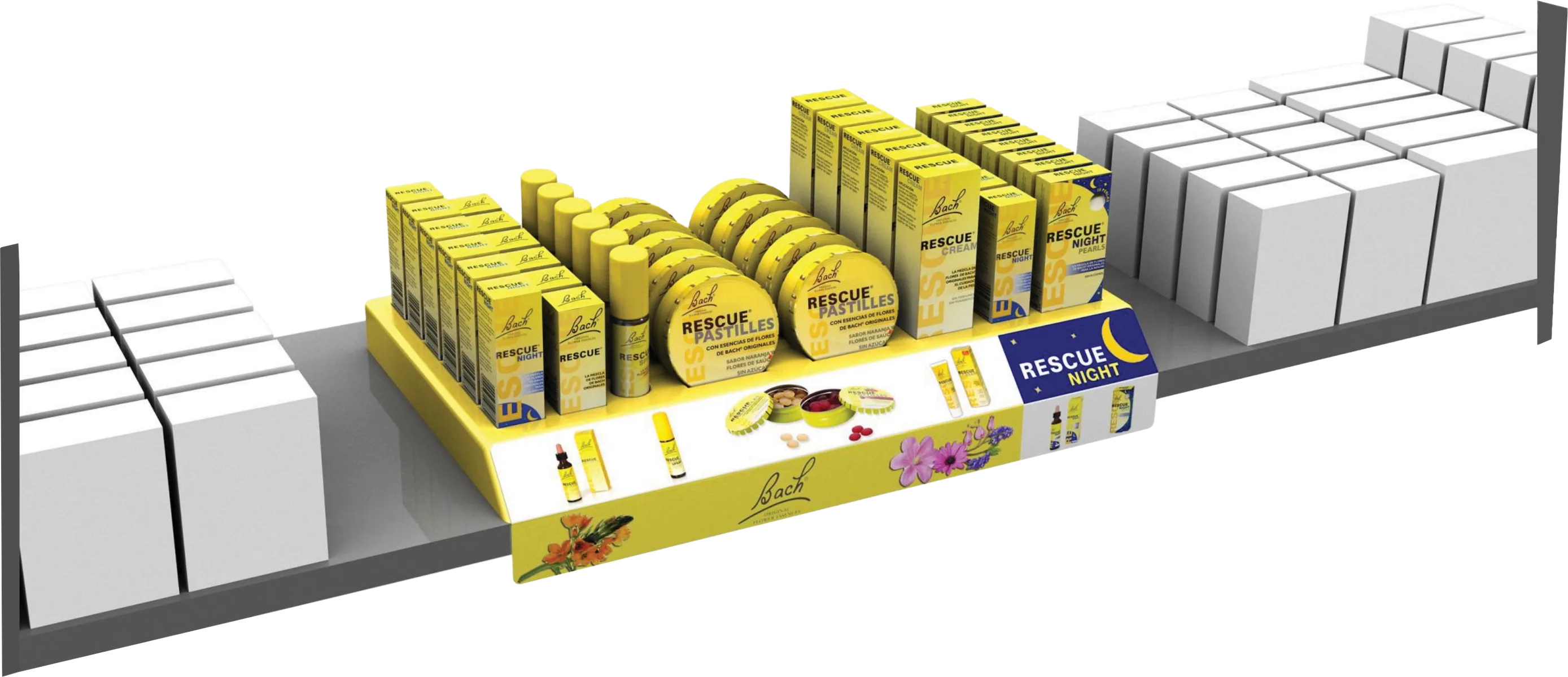 Yellow Bach Rescue tray set on a gondola shelf between neutral boxes, holding drops, spray, pastilles, cream and Rescue Night, with a front printed with flowers
