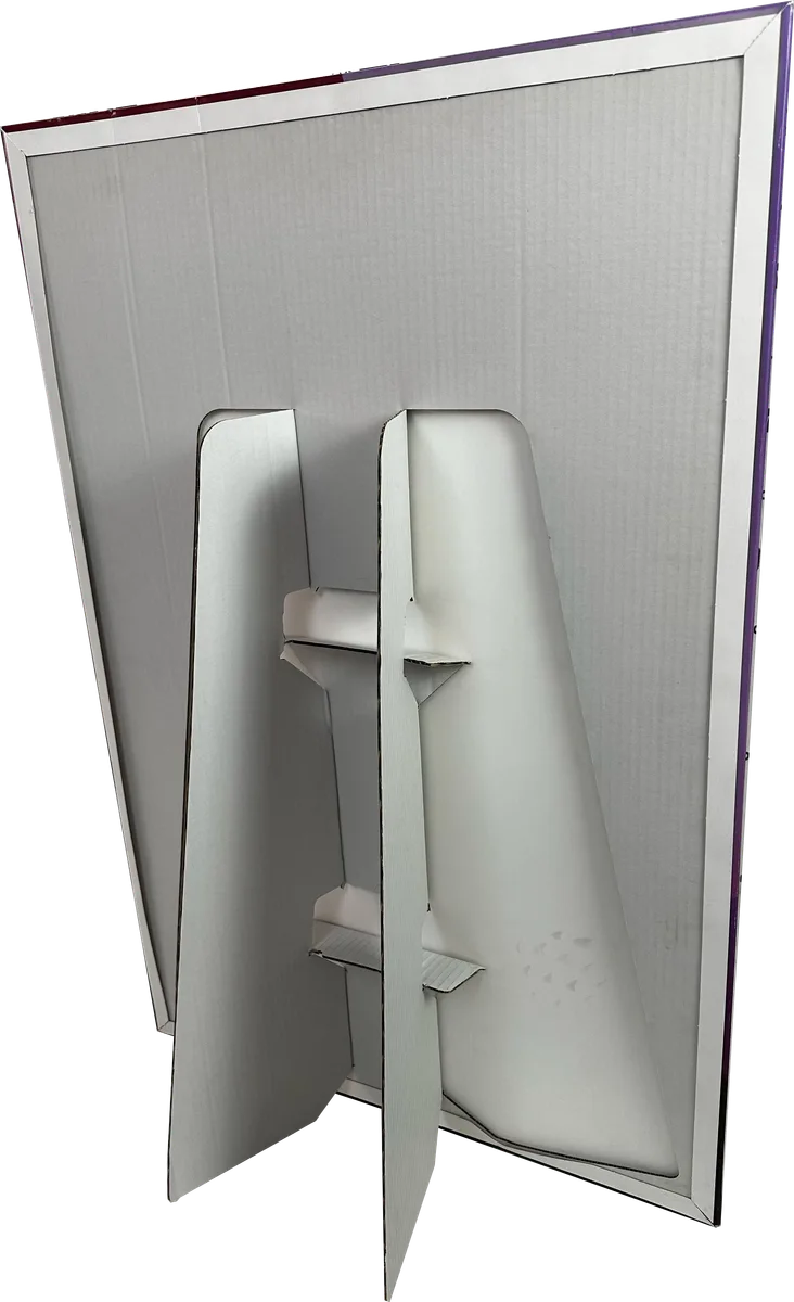 Back of a Pilexil cardboard counter poster, with the die-cut easel foot opened out in a cross and the locking tabs in view